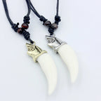 Kaelakee ripatsiga haihammas kuldne