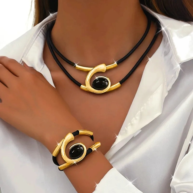 Collana Pendente e Bracciale Geometrici oro