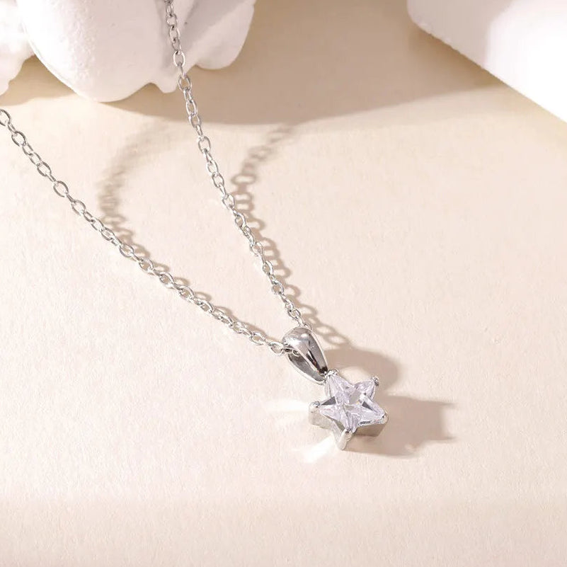 Silver choker necklace with star pendant pavé-set with zirconia