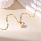 Gold choker necklace with star pendant pavé-set with zirconia