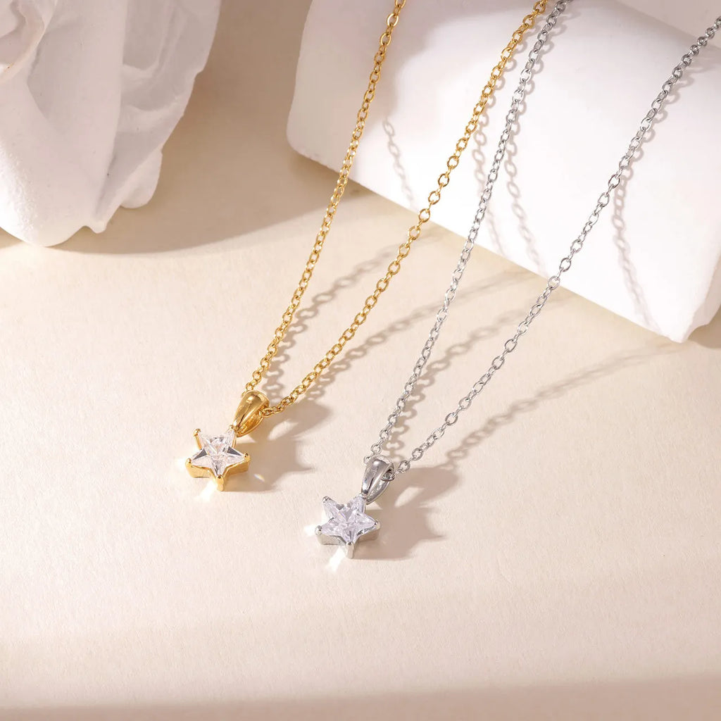 Gold choker necklace with star pendant pavé-set with zirconia