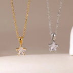 Silver choker necklace with star pendant pavé-set with zirconia