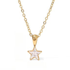 Gold choker necklace with star pendant pavé-set with zirconia
