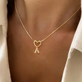 Choker necklace with initial and heart pendant a