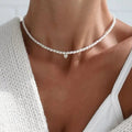 Collier ras de cou avec pendentif perle blanche et coeur