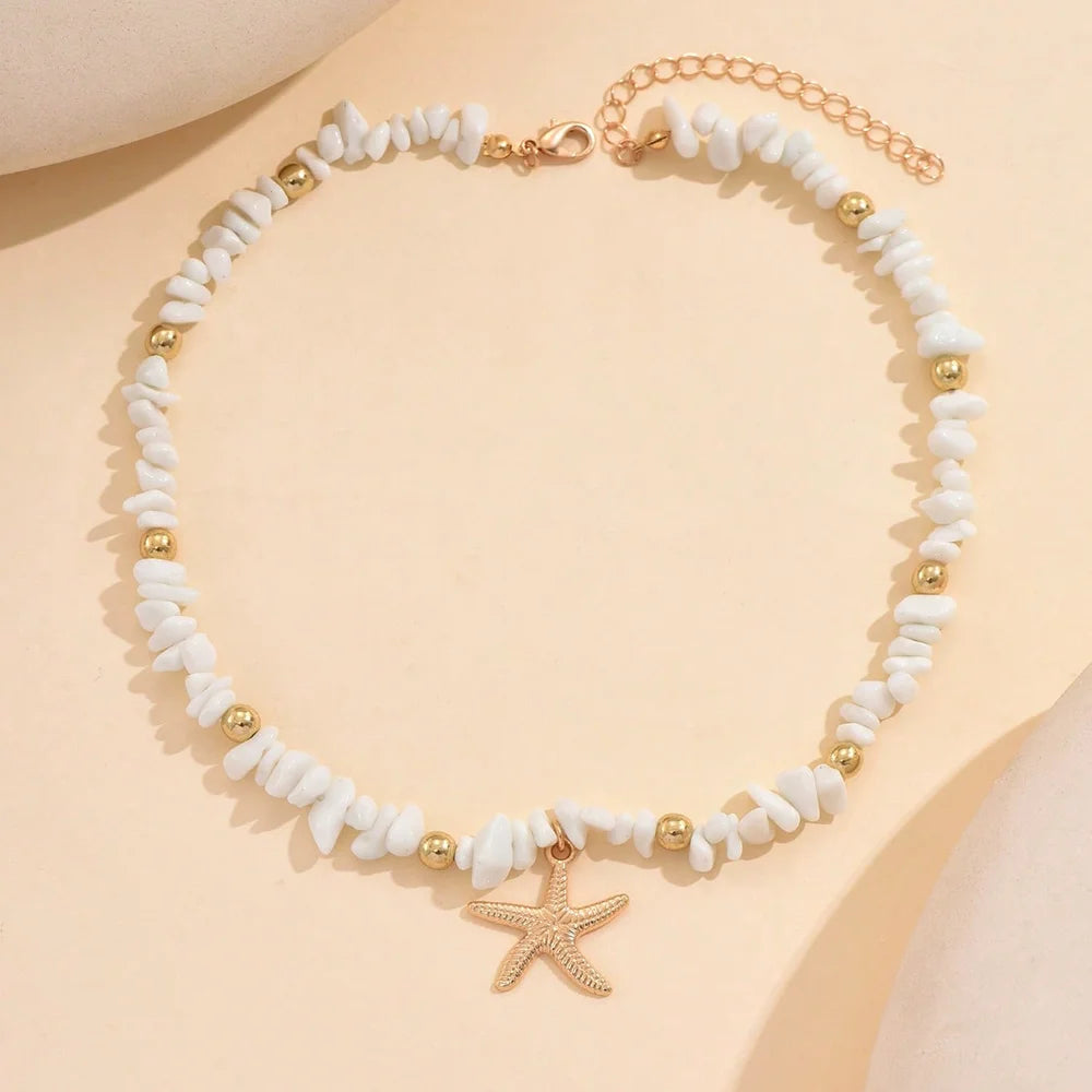 Náhrdelník choker s mušľou a hviezdicou, biele veľké perly