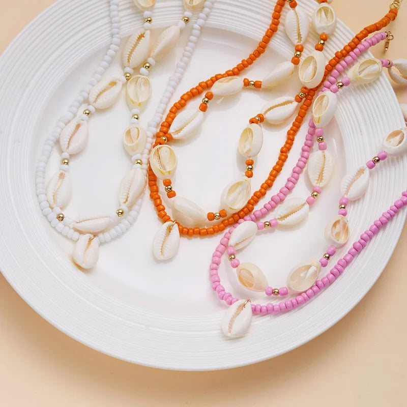 Double cowrie shell necklace red