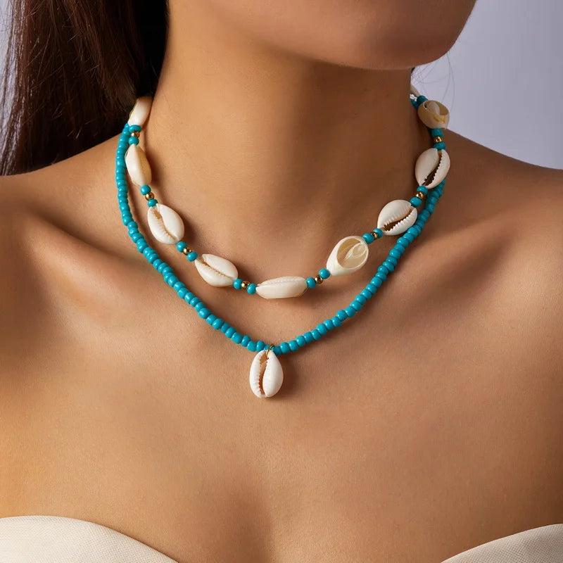 Double cowrie shell necklace turquoise