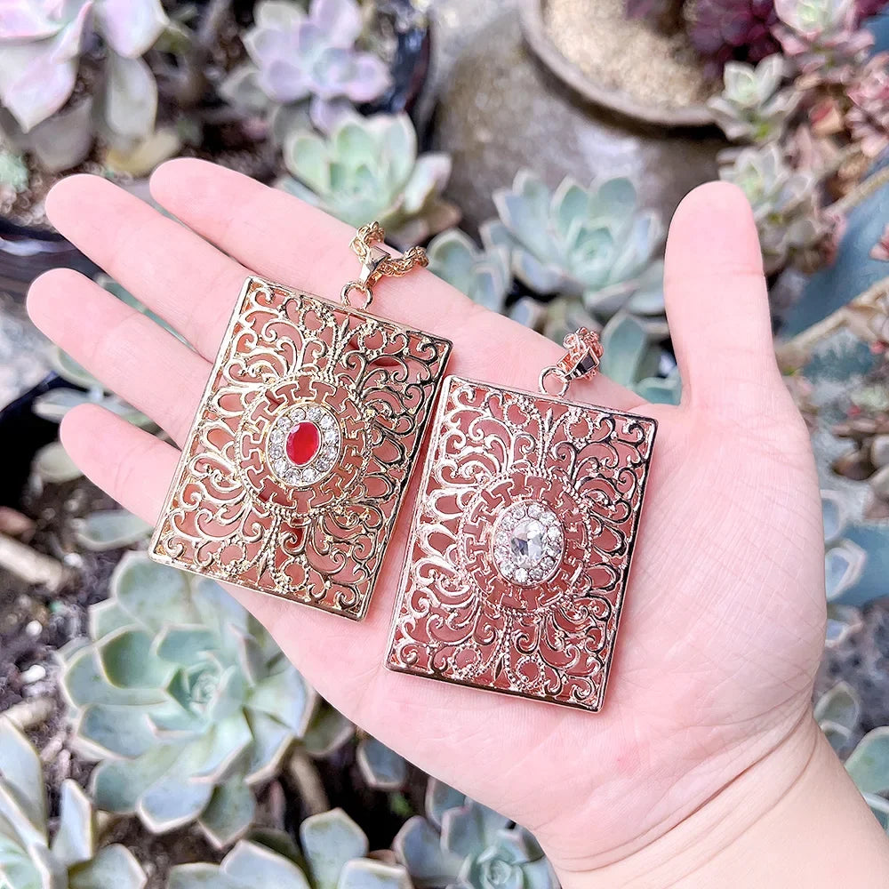 Långt halsband med traditionellt arabiskt vitt hänge 