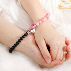 Paararmband Perle rosa und schwarz